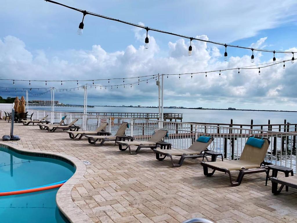 Waterfront Resort Condo with Balcony Close to Beaches Free Bikes